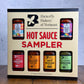 Hot sauce sampler box from Butterfly Bakery of Vermont on a wooden surface