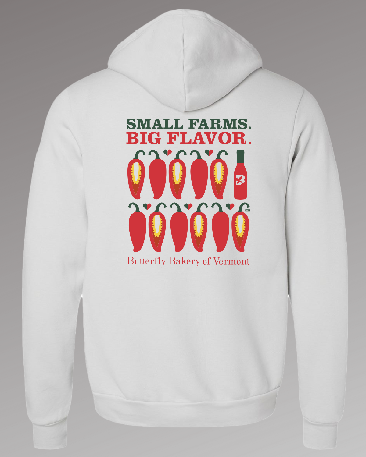 Back view of a silver colored hoodie with a red chili peppers graphic positioned below 'Small Farms. Big Flavor.'
