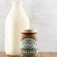 Fat Toad Farm Original Caramel Sauce in front of a bottle of milk on a wood surface