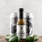 Bottle of Butterfly Bakery of Vermont Heady Topper Hot Sauce next to cans of Heady Topper beer and jalapenos