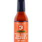 A bottle of Smoked Serrano Squash Reaper X hot sauce with a white background