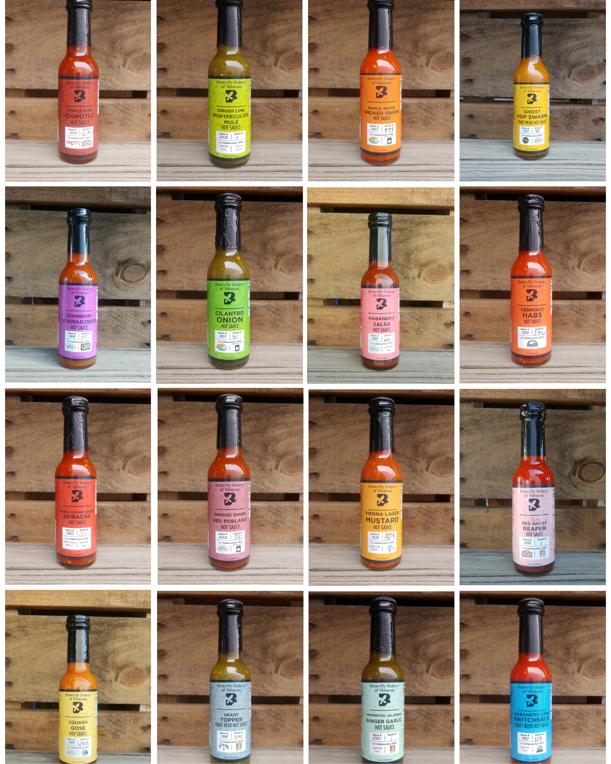 Grid of hot sauce bottles with various labels on a wooden background
