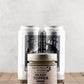 Butterfly Bakery of Vermont Heady Topper Mustard on a wood surface with 2 cans of Heady Topper beer