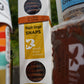 Butterfly Bakery of Vermont Maple Ginger Snaps packaging with a blurred background