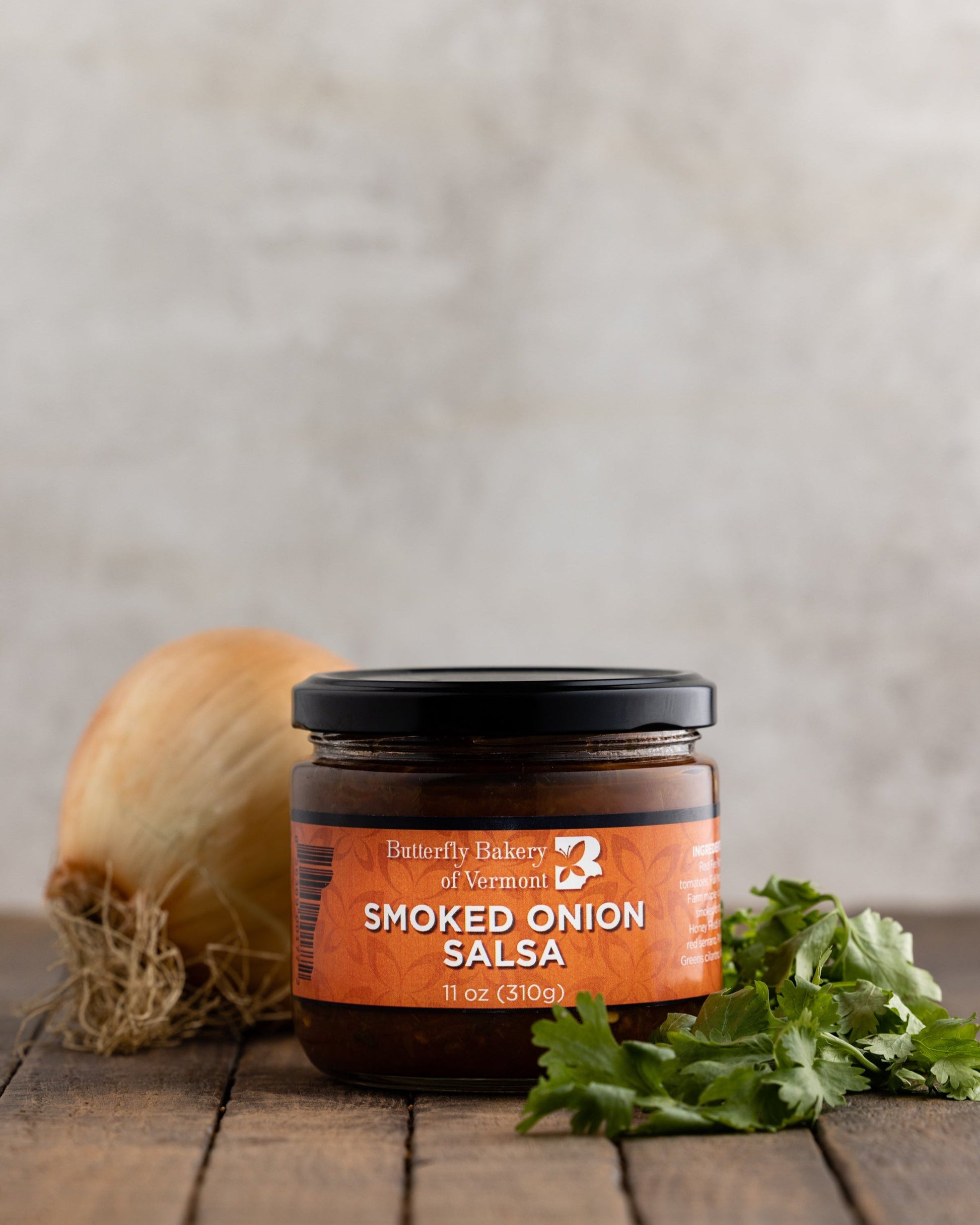 Jar of Smoked Onion Salsa from Butterfly Bakery of Vermont on a wood surface